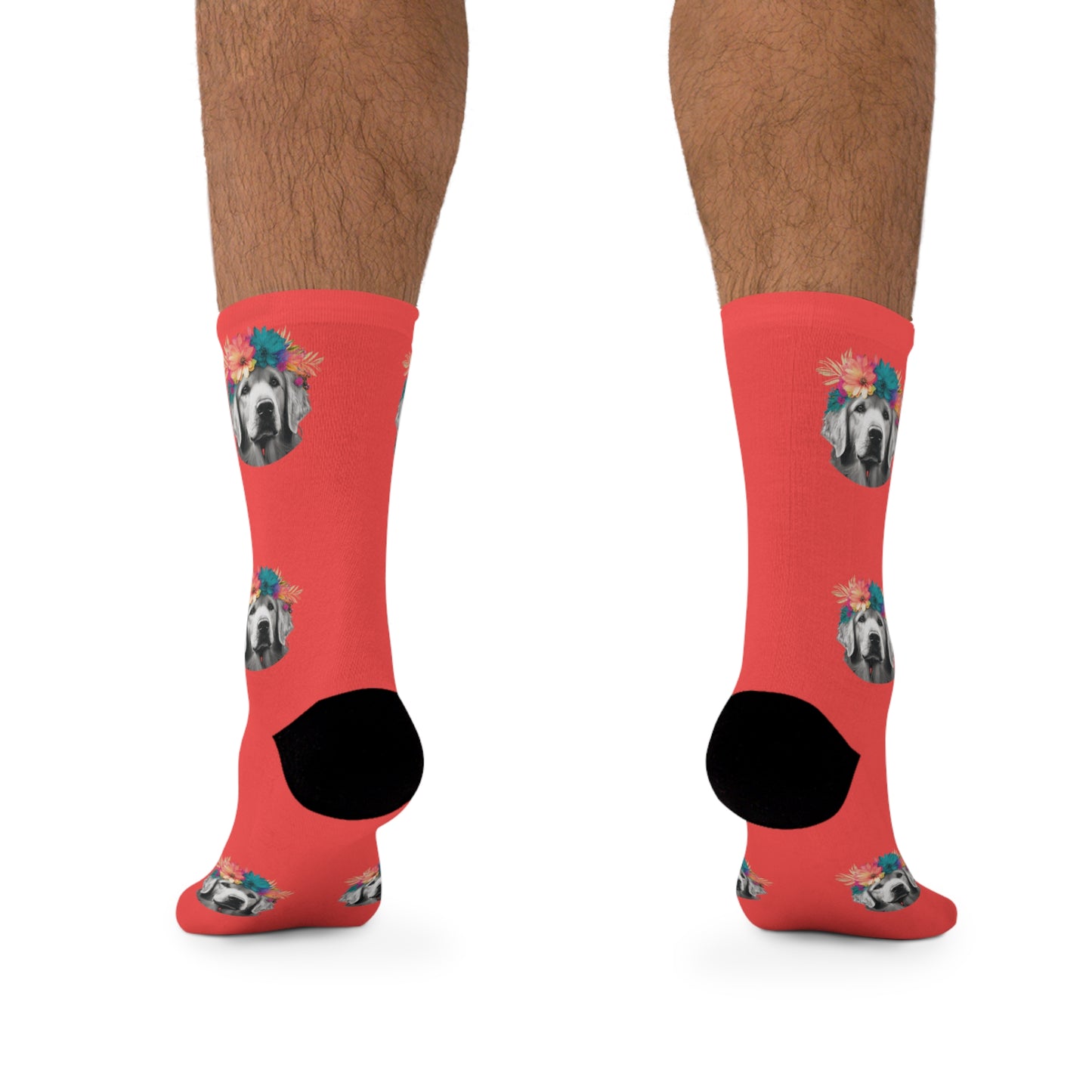 Vibrant, eco-friendly novelty socks depicting a serene Golden Retriever amidst tropical foliage on a coral background, ideal for fashion-conscious, eco-aware individuals.