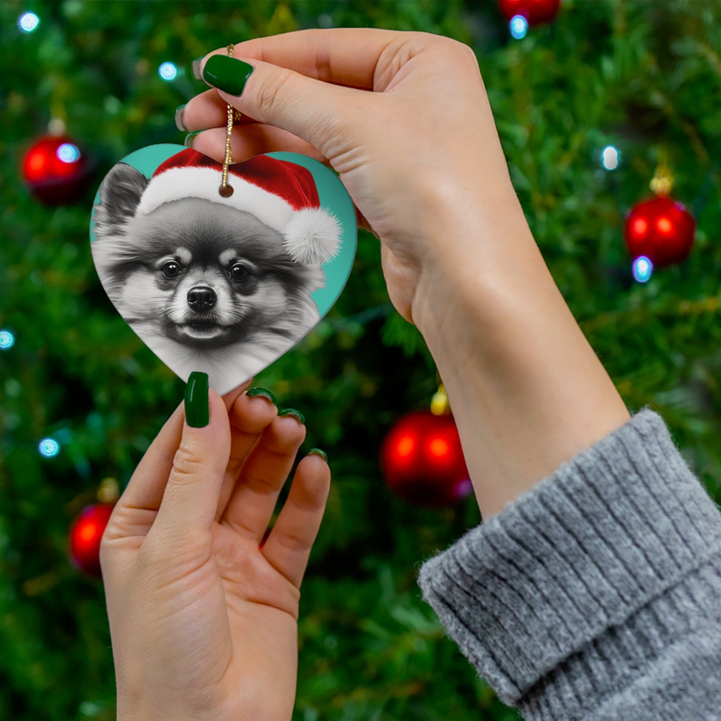 A charming Christmas tree ornament shaped like a Pomeranian, complete with festive decorations, ready to bring holiday spirit to your home