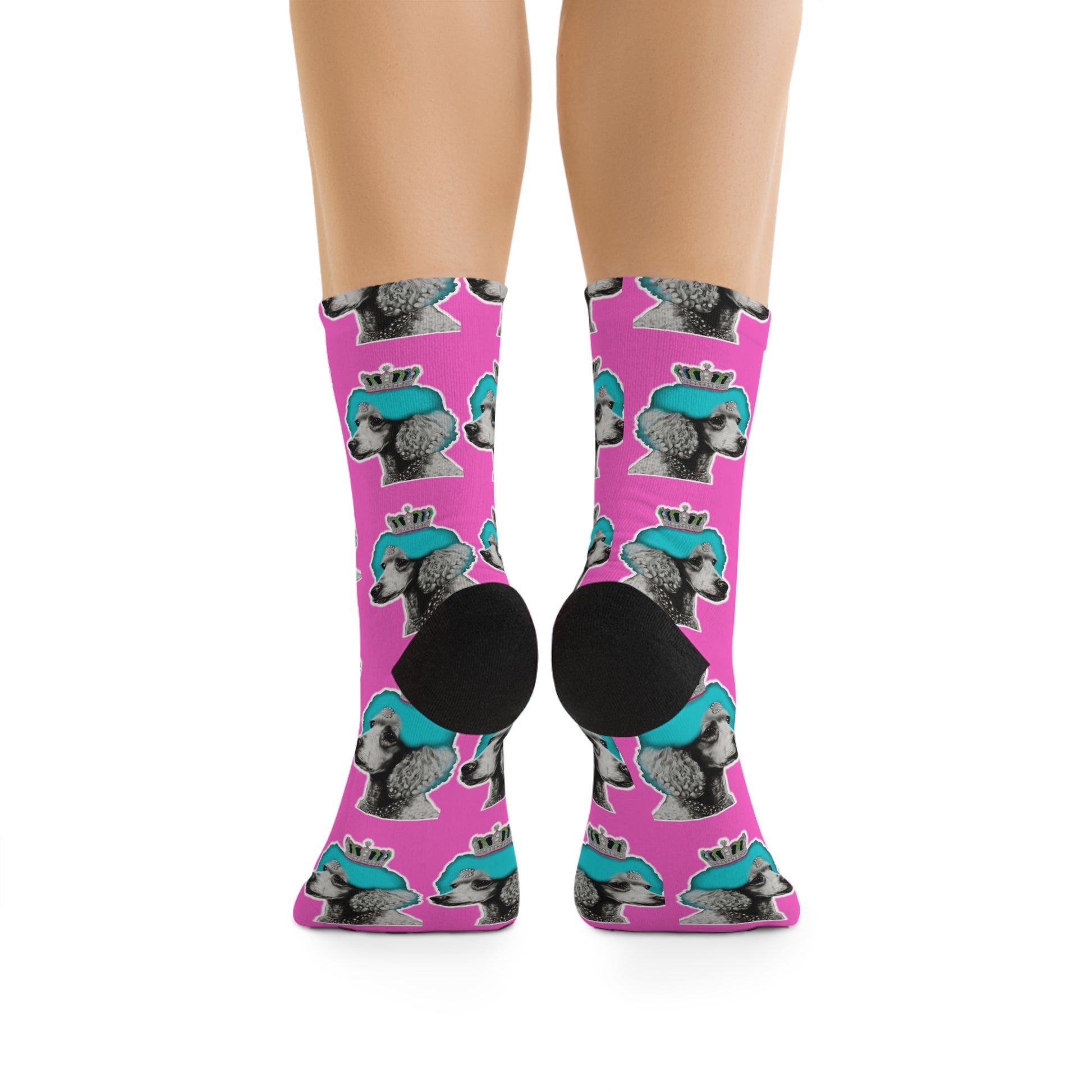 The 'Poodle Pop Art Socks on Pink - Stylish Canine Fashion' feature a vibrant and artistic representation of a poodle in pop art style, set against a pink background, ideal for adding a playful and fashionable touch to any outfit