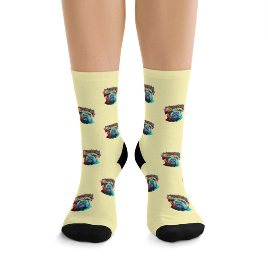 A pair of colorful pop art British Bulldog socks featuring a vibrant bulldog design on a cream background.