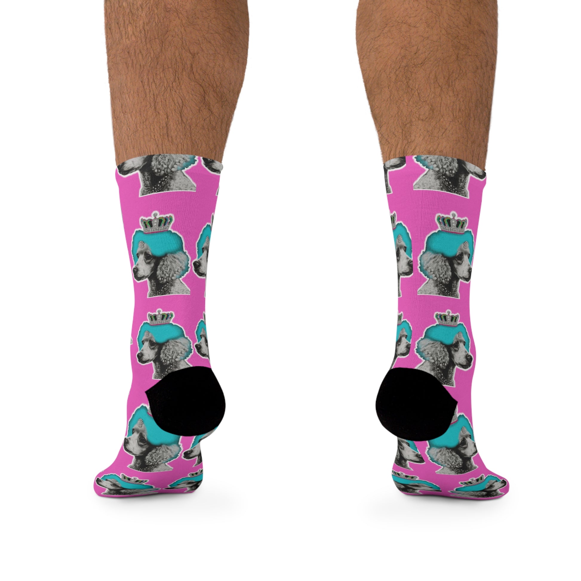 The 'Poodle Pop Art Socks on Pink - Stylish Canine Fashion' feature a vibrant and artistic representation of a poodle in pop art style, set against a pink background, ideal for adding a playful and fashionable touch to any outfit