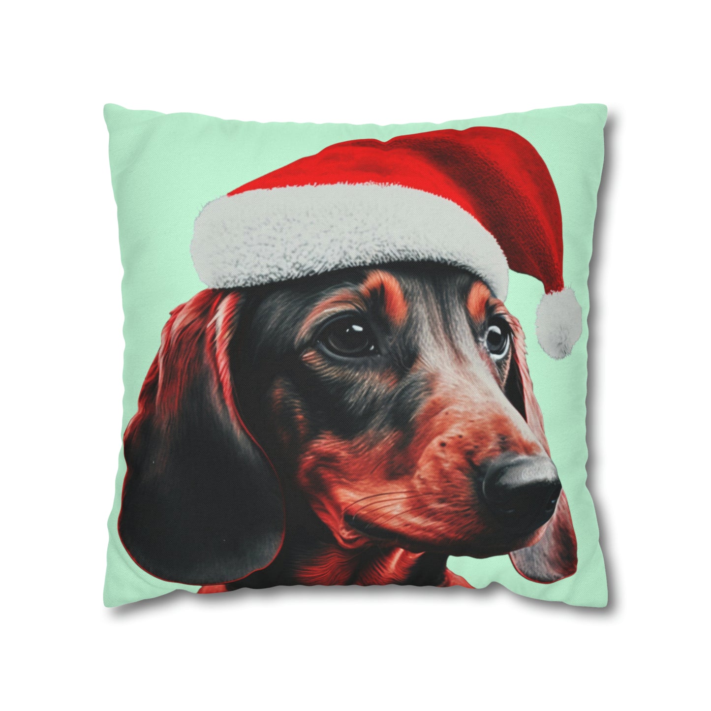 A cushion cover depicting a cute Dachshund wearing a Christmas hat, set against a calming mint green pastel background for a festive and adorable look.