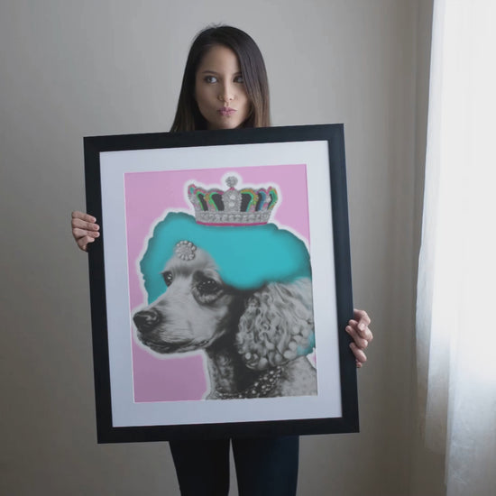 The 'Crowned Poodle on Pink Poster' features an elegant and whimsical illustration of a poodle with a crown, set against a soft pink background. This chic and stylish wall art adds sophistication and a playful touch to any room decor.